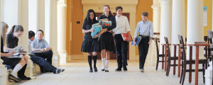 Students walk through the cloister of the Catholic Private School.