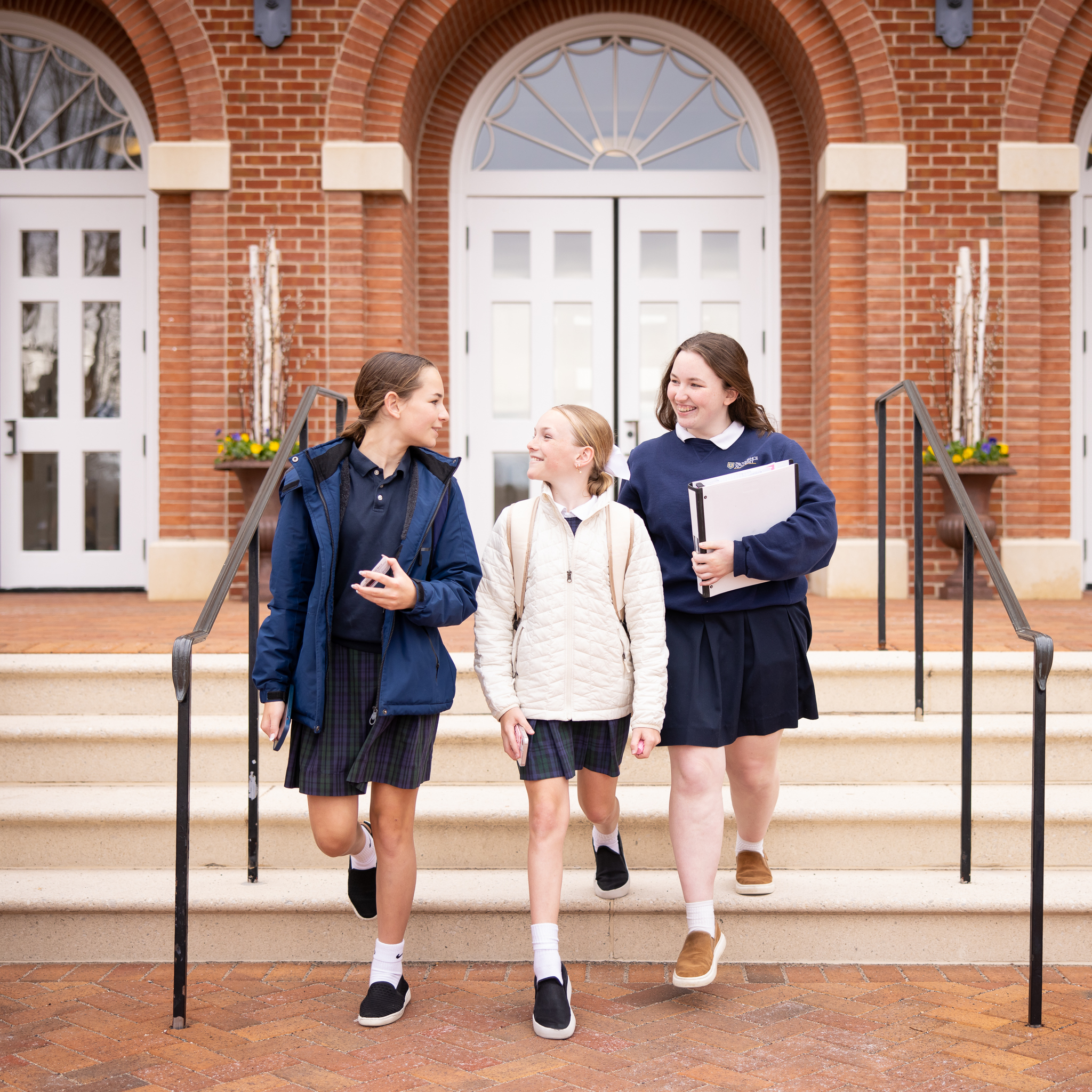 Providence Academy students walking together after school